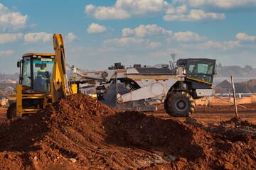 Cold recycler and soil stabilizer