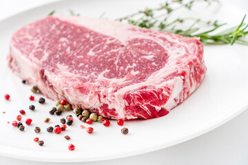 Close up beef rib eye steak isolated on white