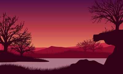 Beautiful twilight sky color with a great view of the mountains from the riverside