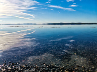 The White Sea coast on a sunny day. The sun's rays. Karelia. 2021. Russia.