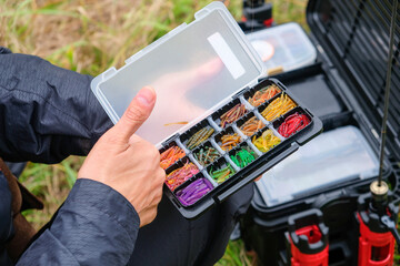 Box with micro silicone baits for spinning fishing.