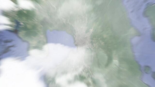 Earth zoom in from outer space to city. Zooming on Philippines, Manila. The animation continues by zoom out through clouds and atmosphere into space. View of the Earth at night. Images from NASA