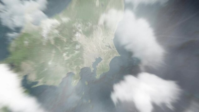 Earth zoom in from outer space to city. Zooming on Japan, Funabashi. The animation continues by zoom out through clouds and atmosphere into space. View of the Earth at night. Images from NASA. 4K