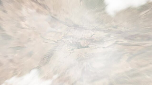 Earth zoom in from outer space to city. Zooming on Herat, Afghanistan. The animation continues by zoom out through clouds and atmosphere into space. View of the Earth at night. Images from NASA. 4K