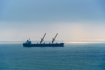 Fototapeta na wymiar ship at sea, seascape with blue sky