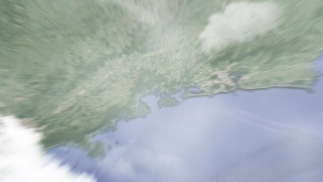 Earth zoom in from outer space to city. Zooming on Angra dos Reis, Brazil. The animation continues by zoom out through clouds and atmosphere into space. Images from NASA