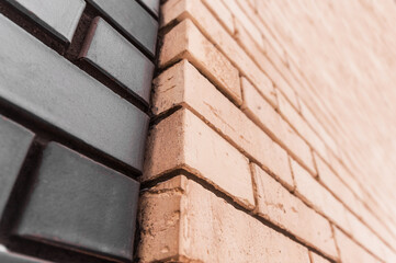 the brickwork wall of a new house under construction