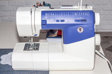Overlock sewing machine. Making clothes, sewing. 