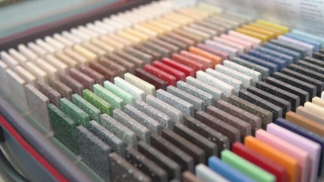 Furniture surface, granite, stone sample tiles set for customers. Choosing design for house kitchen interior, countertop table decoration. Marble texture, bright multicolor copies.