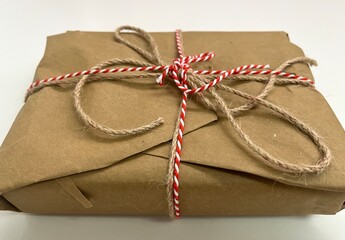 Brown paper package tied with string