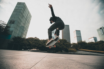 Skateboarder skateboarding outdoors in city