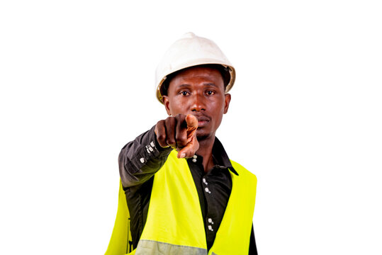 young man construction engineer pointing finger forward.