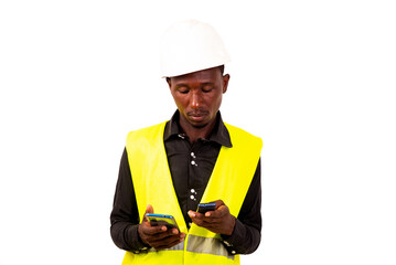 young man engineer holding two mobile phones.