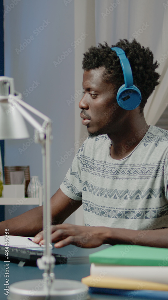 Poster black man working as engineer with architectural software on computer. architect of african ethnicit