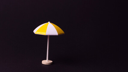 miniature colorful beach umbrella, isolated