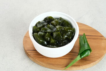 Cincau Hijau (green grass jelly or leaf jelly ), a traditional Indonesian dessert. Selected focus.
