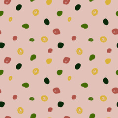 Vector seamless pattern of spots on a pink background. Multi-colored spots are hand-drawn.