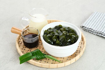 Cincau Hijau (green grass jelly or leaf jelly ), a traditional Indonesian dessert. Selected focus.
