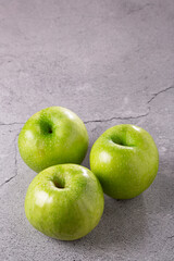 Green apples on the table.