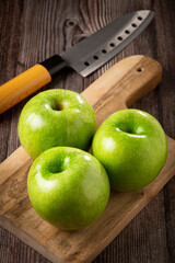 Green apples on the table.