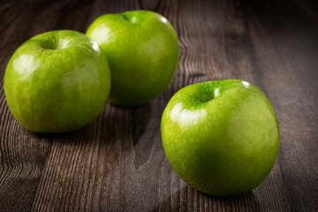 Green apples on the table.