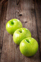 Green apples on the table.