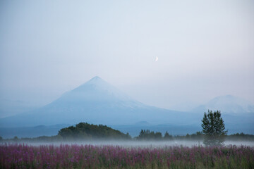 The active Kamchatka Volcano Klyuchevskaya Sopka at dawn