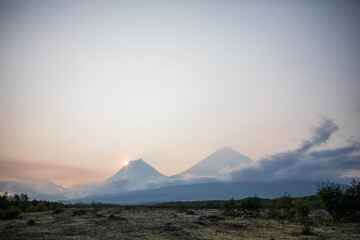 The active Kamchatka Volcano Klyuchevskaya Sopka at dawn