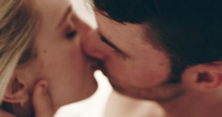 I cant get enough of your lips. Sexy young couple kissing and being intimate at home. Passionate man and woman having sexy moment in bed, enjoying foreplay and romance before making love