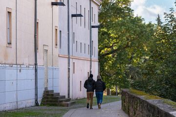 Couple walking along the Paseo de Ronda. Pamplona