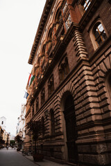Fototapeta premium Huge architectural buildings pressing down the street 