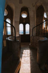 Fototapeta premium Beautiful sunlight shining through the windows of a tower