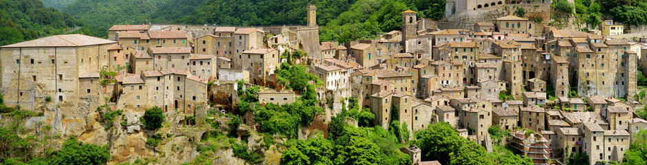 Fototapeta na wymiar Rooftops of Sorano, an ancient medieval hill town hanging from a tuff stone over the Lente River.