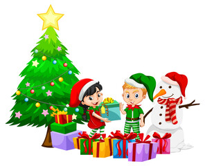 Obraz na płótnie Canvas Christmas season with children in Christmas costumes and snowman
