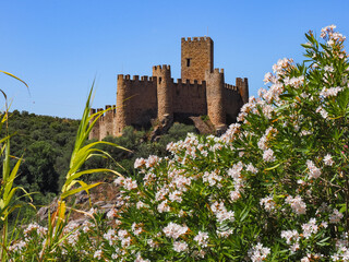 Remains of a Medieval castle of Almourol or 'Castelo de Almourol' on a hill next to tagus river in...