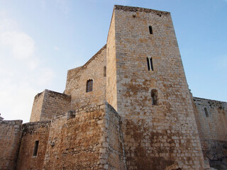 Fototapeta na wymiar Medieval towers of the Templar castle. Fortresses, historical buildings and ancient cities.