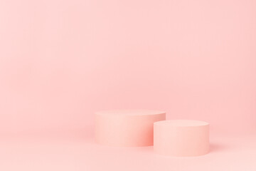 Elegant pastel pink circle two podiums mockup on soft light background, copy space. Template scene for advertising, presentation cosmetic product or goods, design.