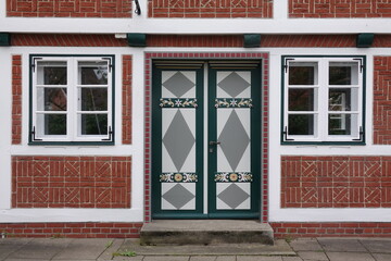 Fototapeta na wymiar Tür an einem Haus in Borstel