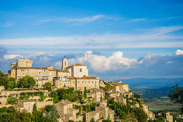Obraz premium Castle and Saint-Firmin church of Gordes, a medieval village in the Luberon valley in France perched on a hilltop