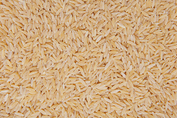 Heaps of uncooked barley vermicelli.