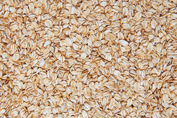 Top view of raw pressed organic oats.