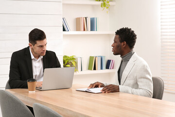 African American man suffering from racial discrimination at work