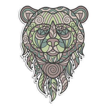 Sticker with a bear's head with abstract patterns in ethnic style