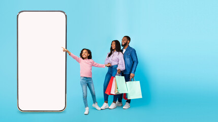 Black family showing blank empty smartphone screen for mockup