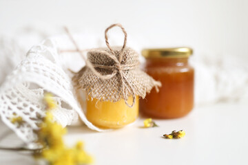 Handmade tasty sweet honey in jars on the food photography