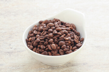 Fototapeta premium Roasted coffee bean in the bowl