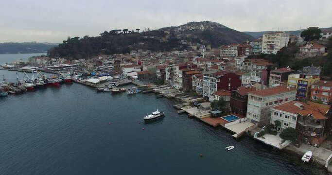 aerial view sunset with fishing boats and seaside houses istanbul