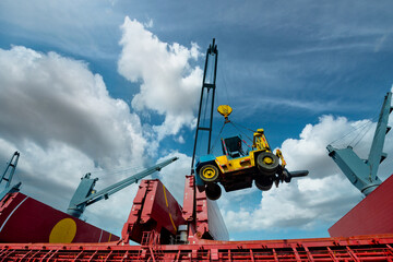 crane of the ship lifting machinery forklift for operation in the port terminal, lifting heavy...