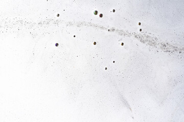 Water foam texture. Abstract background texture of white soap foam. Chemical detergent backdrop. Detergents and hygiene.