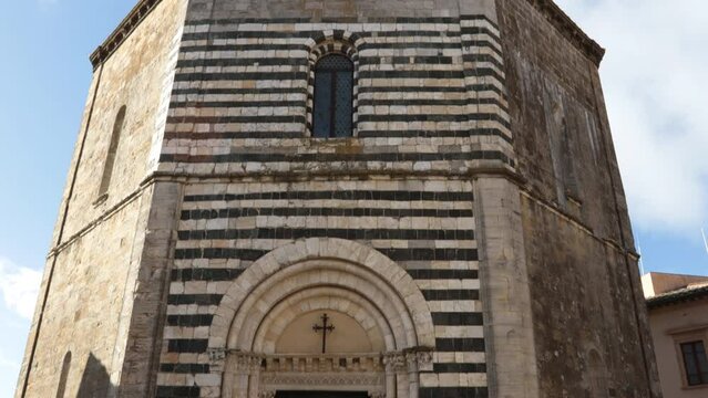 The Baptistery of San Giovanni in the historic center of Volterra, in front of the Duomo, Diocese of Volterra in Tuscany, Italy.
